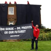 Greenpeace activists on the roof of Britain's Prime Minister Rishi Sunak's manor house in Kirby Sigston