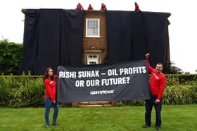 Greenpeace activists on the roof of Britain's Prime Minister Rishi Sunak's manor house in Kirby Sigston