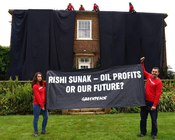 Greenpeace activists on the roof of Britain's Prime Minister Rishi Sunak's manor house in Kirby Sigston