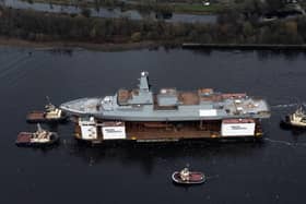 HMS Glasgow enters the water for first time. Pic John Devlin