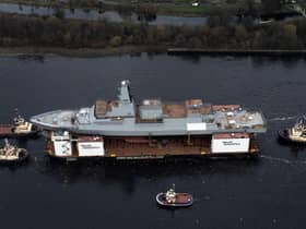 HMS Glasgow enters the water for first time. Pic John Devlin
