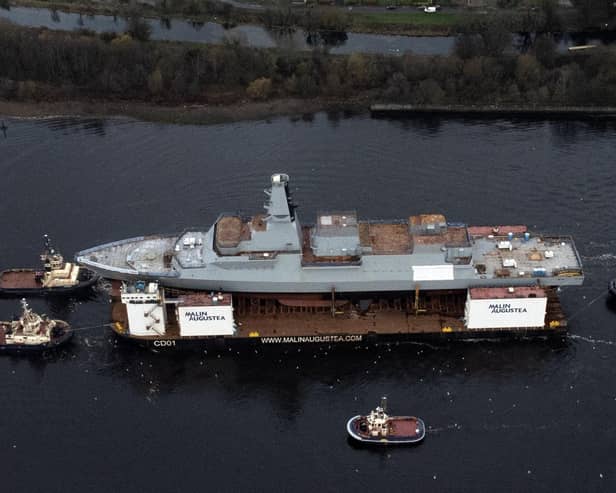 HMS Glasgow enters the water for first time. Pic John Devlin