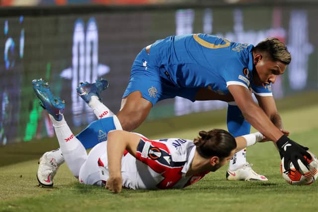 Rangers striker Alfredo Morelos tussles with Red Star Belgrade defender Aleksandar Dragovic during the Europa League match in Serbia on Thursday. (Photo by Alex Pantling/Getty Images)