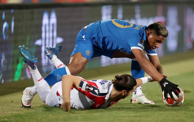 Rangers striker Alfredo Morelos tussles with Red Star Belgrade defender Aleksandar Dragovic during the Europa League match in Serbia on Thursday. (Photo by Alex Pantling/Getty Images)