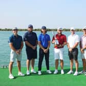 Defending Abu Dhabi HSBC champion Tyrrell Hatton, centre, is flanked, from left, by Viktor Hovland, Shane Lowry, Tommy Fleetwood, Rory McIlroy, Collin Morikawa, Adam Scott and Lee Westwood in the build up to this week's event at Yas Links. Picture: Andrew Redington/Getty Images.