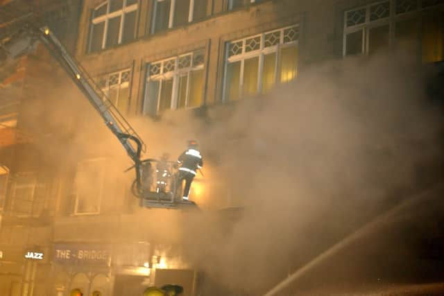 Firefighters tackle the blaze in Edinburgh's Cowgate   Pic: Tony Marsh