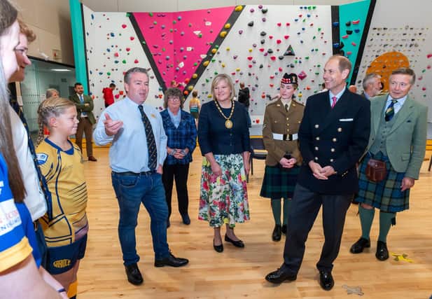 The Duke of Edinburgh was impressed by the bouldering wall and spoke with a number of groups who use the various facilities at Inverurie Community Campus