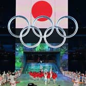 Japan's delegation enter the Olympic Stadium during the opening ceremony of the Tokyo 2020 Olympic Games, in Tokyo, on July 23, 2021.