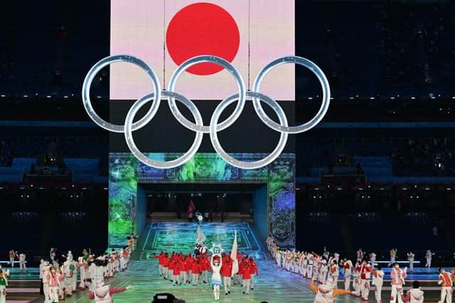 Japan's delegation enter the Olympic Stadium during the opening ceremony of the Tokyo 2020 Olympic Games, in Tokyo, on July 23, 2021.