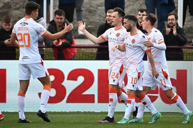 Lawrence Shankland celebrates soaring the winner for Dundee United in last night's Premier Sports Cup tie against Kelty Hearts  (Photo by Paul Devlin / SNS Group)