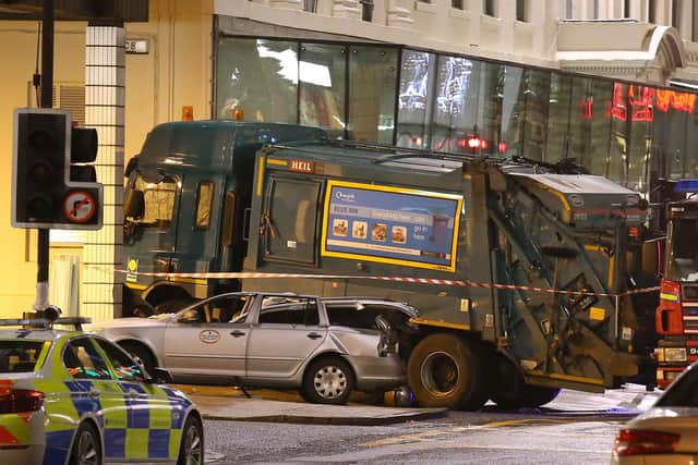 The bin lorry crashed into the side of the Millennium Hotel in George Square, where Queen Street Station has since been extended. Picture: Andrew Milligan/PA Wire