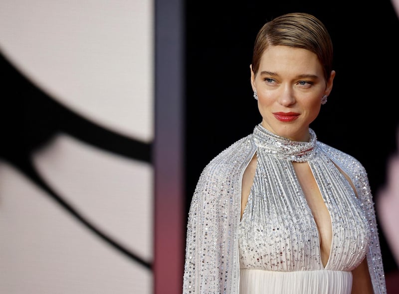 French actor Lea Seydoux poses on the red carpet after arriving to attend the World Premiere of the James Bond 007 film "No Time to Die" at the Royal Albert Hall in west London.