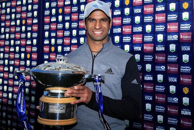 England's Aaron Rai poses with the trophy after beating compatriot Tommy Fleetwood in a play-off to win the Aberdeen Standard Investments Scottish Open at The Renaissance Club. Picture: Andrew Redington/Getty Images