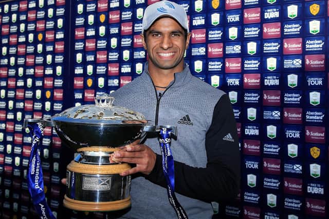 England's Aaron Rai poses with the trophy after beating compatriot Tommy Fleetwood in a play-off to win the Aberdeen Standard Investments Scottish Open at The Renaissance Club. Picture: Andrew Redington/Getty Images