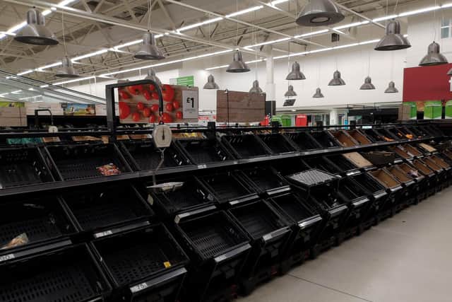 Empty shelves are pictured in a food aisle of a supermarket in London (Getty Images)