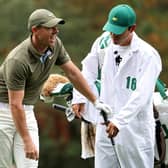 Rory McIlroy reacts to his second shot on the 15th hole during the continuation of the first round of the Masters at Augusta National. Picture: Jamie Squire/Getty Images