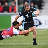 Glasgow's Nick Grigg powers past Lion's Stean Pienaar at Scotstoun on Saturday.  (Photo by Rob Casey / SNS Group)