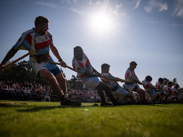 Competitors take part in the tug of war during the Braemar Gathering