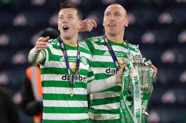 Callum McGregor  and Scott Brown prepare to lift the Scottish Cup last December - the last of the 22 honours the veteran won in his 14 years at Celtic. (Photo by Bill Murray / SNS Group)