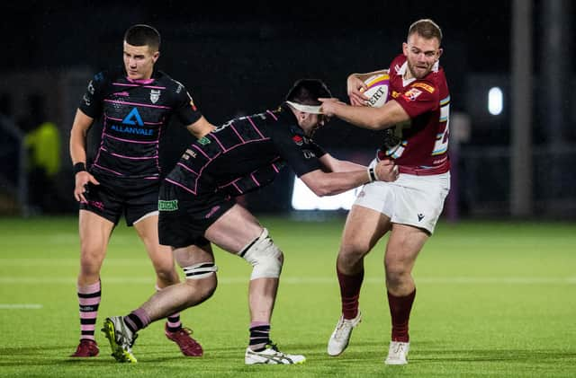 Connor Eastgate (R) of Watsonians in action against Rory Jackson of Ayrshire Bulls during the FOSROC Super6 Final match between Watsonians and Ayrshire Bulls last year.