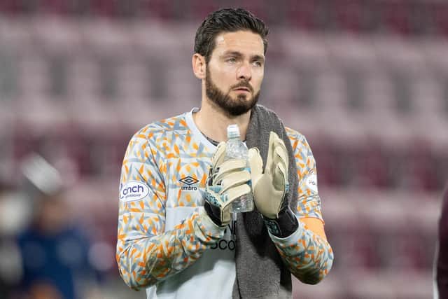Hearts goalkeeper Craig Gordon has not put a timeline on his return from a double leg break.  (Photo by Paul Devlin / SNS Group)