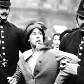 A suffragette is arrested by police officers in 1914. The Representation of the People Act, passed in 1918, gave certain women over the age of 30 a vote and the right to stand for Parliament. (Picture: PA)