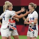 Ellen White is congratulated by her Team GB team-mates after scoring the winner against Japan