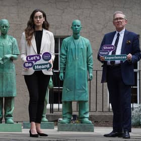 Dr Alexandra Anderson and Lord Brailsford of the inquiry team at the NHS memorial statue within the grounds of The Royal College of Surgeons, Edinburgh. (Pic:  Stewart Attwood)