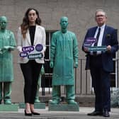 Dr Alexandra Anderson and Lord Brailsford of the inquiry team at the NHS memorial statue within the grounds of The Royal College of Surgeons, Edinburgh. (Pic:  Stewart Attwood)