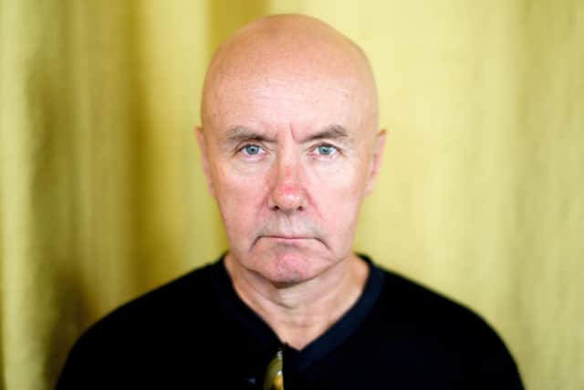 In this picture taken on November 8, 2018, Scottish novelist Irvine Welsh poses during an interview with AFP in Hong Kong. - Twenty-five years ago Irvine Welsh's debut novel "Trainspotting" burst out of the housing schemes and back alleys of post-industrial Scotland in a whirlwind of drugs, sex and violence that horrified and delighted critics alike. Scotland's most famous ex-heroin addict is still delivering the goods, and is as far as ever from settling for "carpet slippers and a cottage on the coast." (Photo by Anthony WALLACE / AFP) (Photo credit should read ANTHONY WALLACE/AFP via Getty Images)