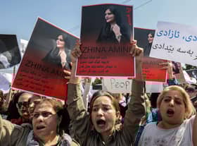 Protests in Iran and across the world broke out after 22-year-old Mahsa Amini died while in the custody of Iran's 'morality police' (Picture: Safin Hamed/AFP via Getty Images)