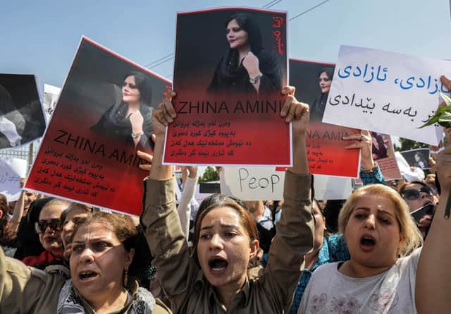 Protests in Iran and across the world broke out after 22-year-old Mahsa Amini died while in the custody of Iran's 'morality police' (Picture: Safin Hamed/AFP via Getty Images)