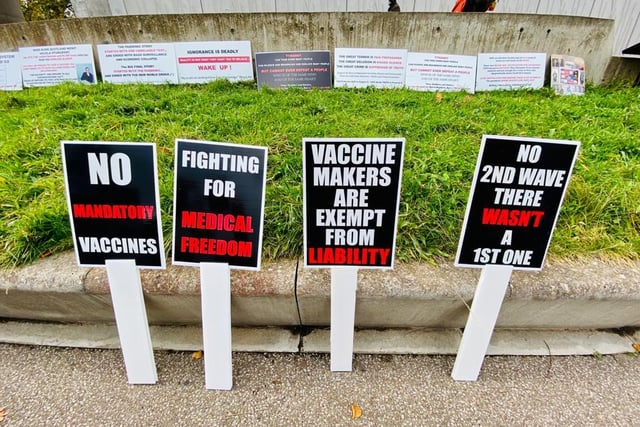 A row of placards used by the activists during Saturday's anti-mask demonstration which saw hundreds descend on Holyrood Park so protest lockdown rules and mandatory vaccines.