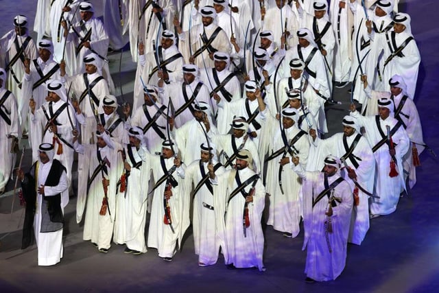 Performers welcomed fans to the Al Bayt Stadium.