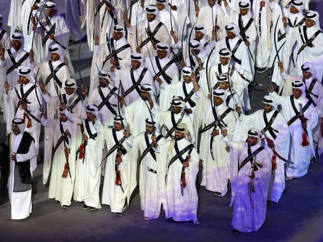 Performers welcomed fans to the Al Bayt Stadium.