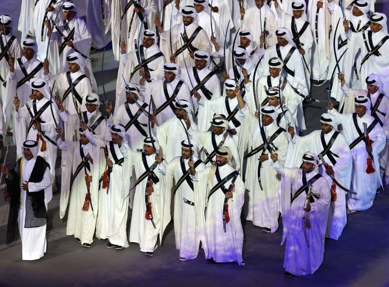 Performers welcomed fans to the Al Bayt Stadium.