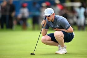 Connor Syme lines up a putt on the 16th green during day four of the Magical Kenya Open at Muthaiga Golf Club in Nairobi. Picture: Stuart Franklin/Getty Images.