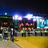 A few fans outside Celtic Park during the Scottish Premiership match between Celtic and St Johnstone at Celtic Park on December 06, 2020, in Glasgow, Scotland. (Photo by Rob Casey / SNS Group)