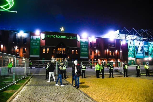 A few fans outside Celtic Park during the Scottish Premiership match between Celtic and St Johnstone at Celtic Park on December 06, 2020, in Glasgow, Scotland. (Photo by Rob Casey / SNS Group)