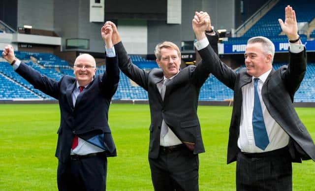 Dave King (centre) celebrates with colleagues John Gilligan (left) and Paul Murray (right) after their success in forcing regime change at Rangers in March 2015. (Photo by Craig Williamson/SNS Group).