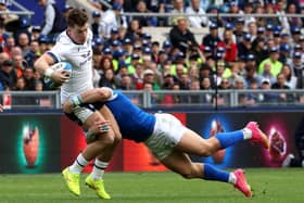 Blair Kinghorn of Scotland is tackled by Italy's Tommaso Menencello as the visitors let slip a lead against the Azzurri in Rome.