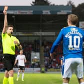 Referee Daniel Siebert sends off St Johnstone's David Wotherspoon for an elbow in the 2-0 defeat to LASK at McDiarmid Park (Photo by Craig Foy / SNS Group)