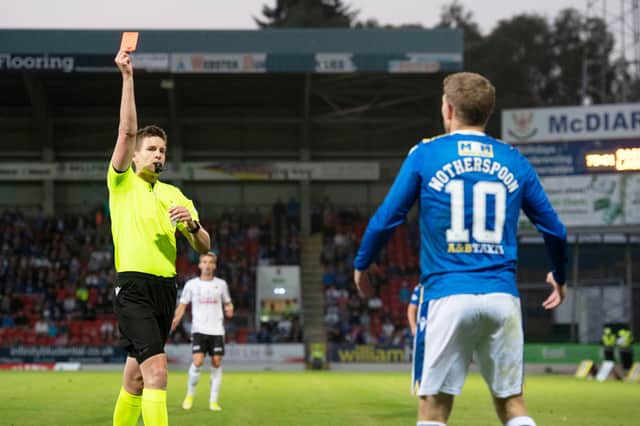 Referee Daniel Siebert sends off St Johnstone's David Wotherspoon for an elbow in the 2-0 defeat to LASK at McDiarmid Park (Photo by Craig Foy / SNS Group)