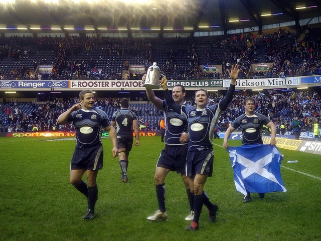Scotland players celebrate a 15-9 win over England in the Six Nations at Murrayfield on March 8, 2008.