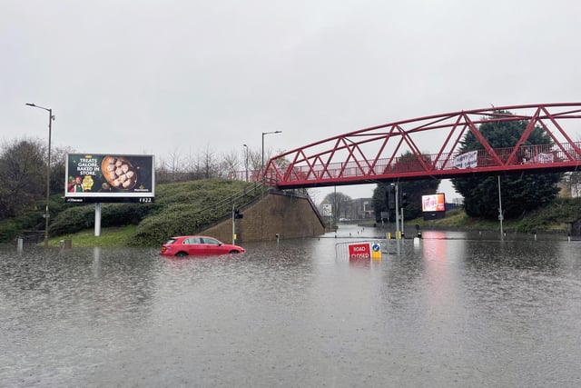 A general view of flooding in Edinburgh, as an amber weather warning in eastern Scotland has been extended as heavy rain drenches parts of the country, with flooding leading to school closures and disruption on roads and railways.