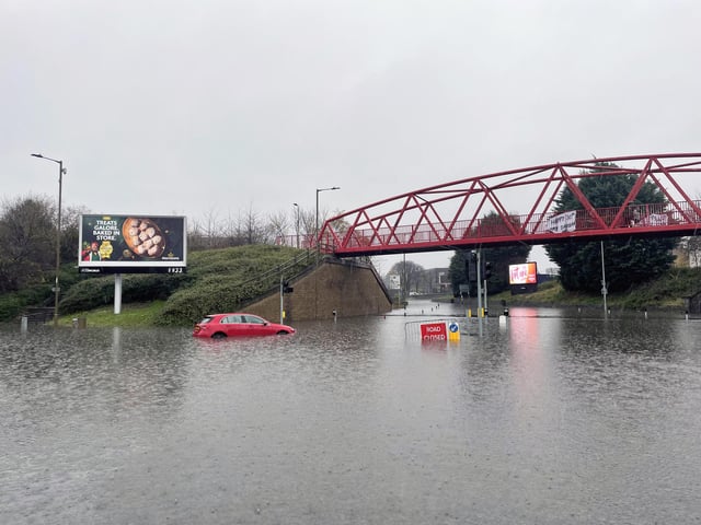 A general view of flooding in Edinburgh, as an amber weather warning in eastern Scotland has been extended as heavy rain drenches parts of the country, with flooding leading to school closures and disruption on roads and railways.