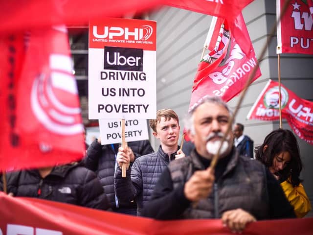 Uber drivers protest outside the Uber offices in London in 2019 (Photo: Peter Summers/Getty Images)