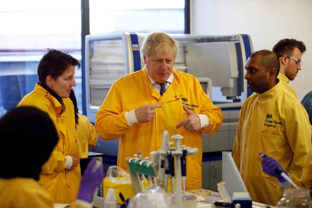 Prime Minister Boris Johnson visits a laboratory at the Public Health England National Infection Service in Colindale, north London. Picture: Henry Nicholls/PA Wire