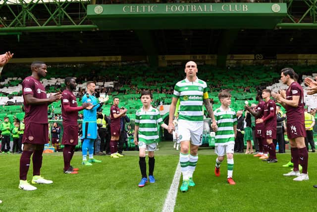 Giving a guard of honour to league champions before the end of the season is a tradition in Scottish football - as displayed by Hearts at Celtic Park in 2017. Pic: SNS