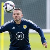 John McGinn keeps his eye on the ball during a Scotland training session ahead of the World Cup play-off against Ukraine.